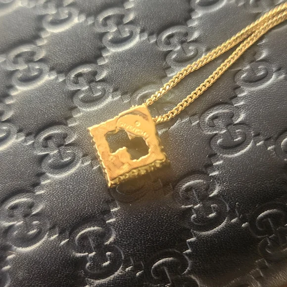Givenchy Gold Intricate Pendant Necklace